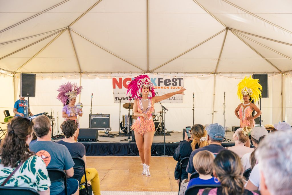 Three women dance in a demonstration of Brazilian dance
